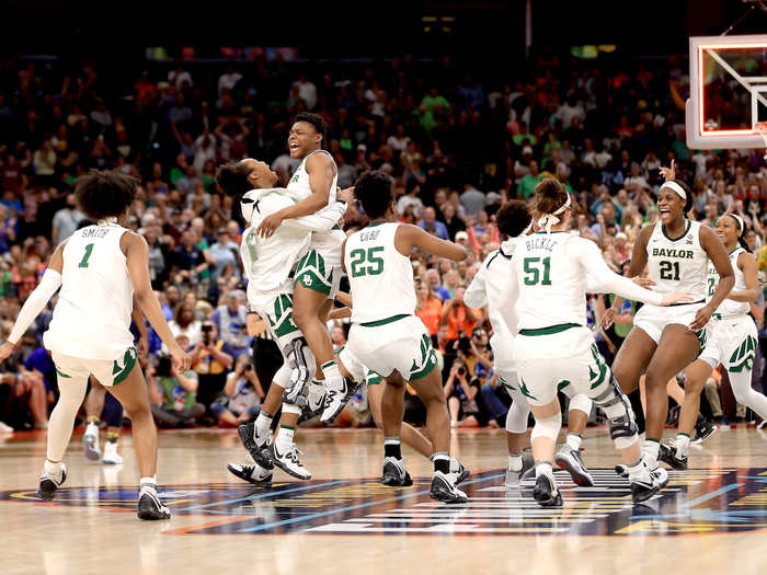 The Baylor Lady Bears celebrate beating Muffet McGraw