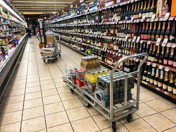 Next, I dipped into the wine, spirits, and beer section. There were a few restock carts sitting in the aisle.