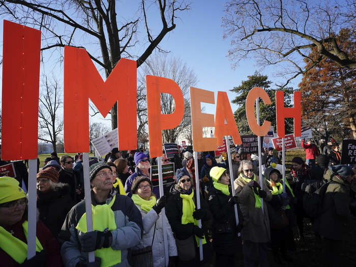 Outside the Capitol, protesters called for Trump to be impeached.