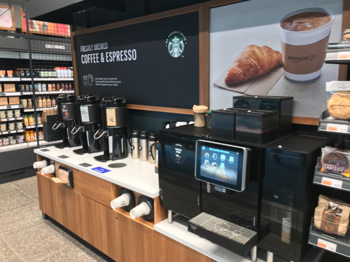 …and a Starbucks coffee counter with an automated machine to make fancy drinks.