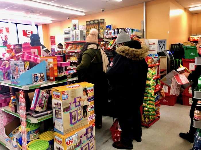 The checkout line was growing when we first arrived, but by the time we went to pay, it was empty.