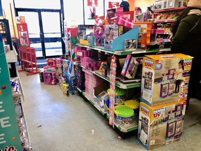 A messy toy display at the front of the store did not do well for first impressions.