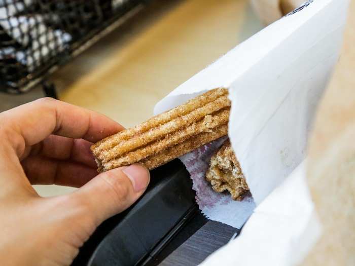 I reached for a sugar-dusted mini churro ($1.09 for two) to balance out all the salt I had just consumed.