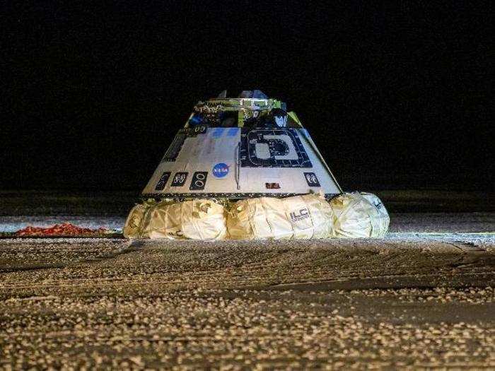 The space capsule landed gently on the sandy turf just before dawn on Sunday.