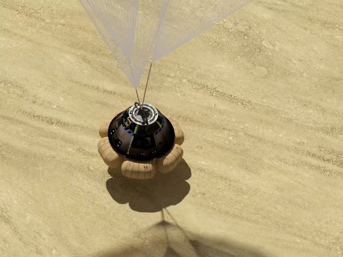 ... And blew up impact-absorbing airbags before landing in the desert.