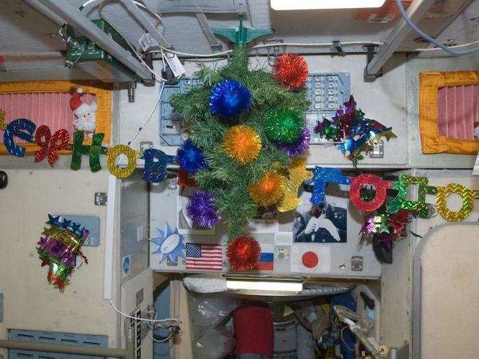 And of course decorations are a must, as proven by this photo taken in the run-up to Christmas aboard the Russian segment of the ISS in 2012.