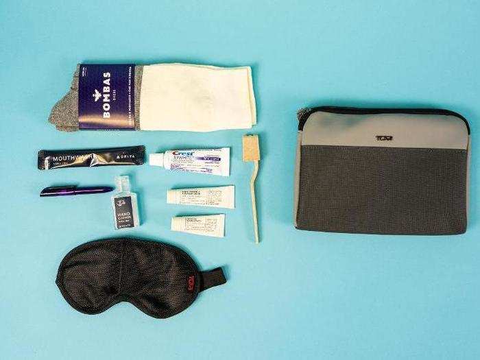 The kit also comes with a toothbrush and toothpaste, mouthwash, hand sanitizer, socks, a pen, and a sleep mask. It doesn