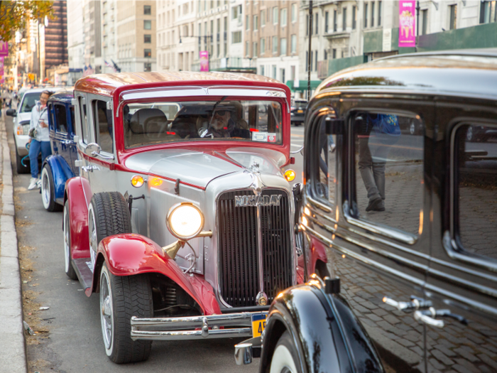 A maroon and silver 1931 Chrysler Model 70.