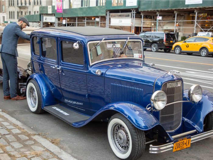 A navy blue 1932 Ford Model B.