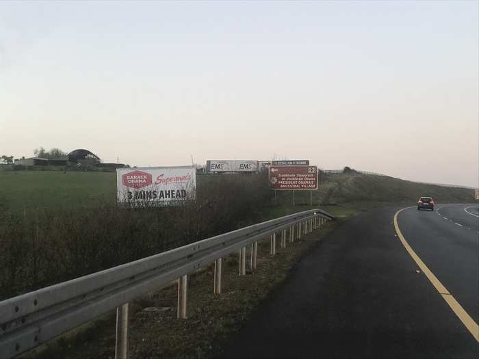 You start to see signs for the Barack Obama Plaza as you drive along the highway.