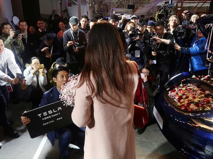 One employee even proposed to his girlfriend at the ceremony. One car was filled with flowers for the occasion.