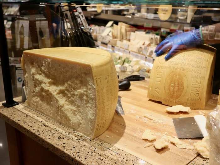 ... watch Parmigiano-Reggiano get sliced right before our eyes at a cheese station ...