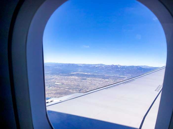 Finally, the plane began to descend. I was still hungry, cold, and uncomfortable, but less so than I would have been on another airline.