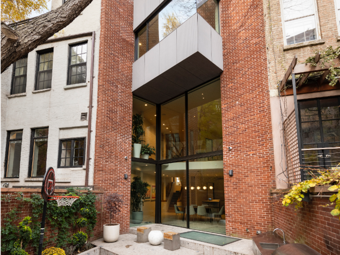 The rear of the townhouse features a 20-foot wall of windows.