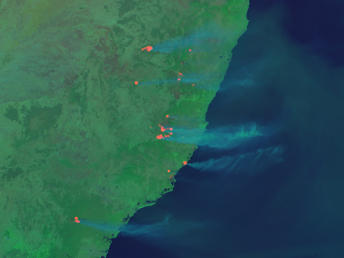 Redder and longer wavelengths of light, such as near-infrared, can show fiery hotspots on the ground through the haze and smoke.