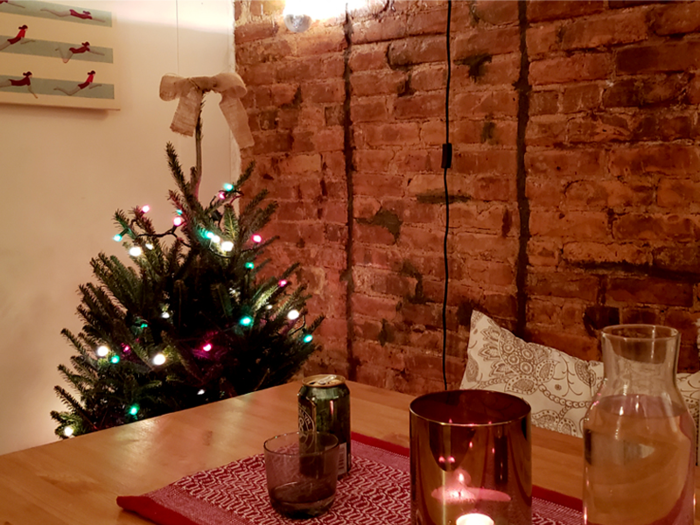 My guest and I entered the apartment and were greeted by one of the hosts, a handful of other Eatwith guests, and a well-decorated dining area.