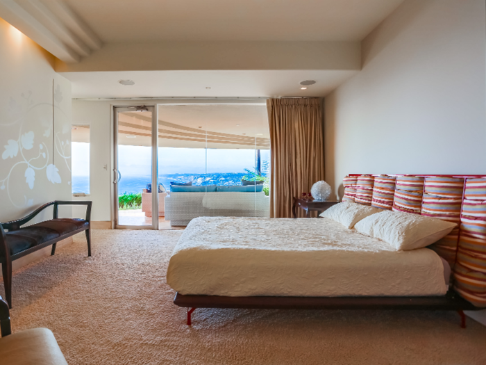 ... and the master suite has a private balcony with stunning hillside views of the Pacific Ocean.