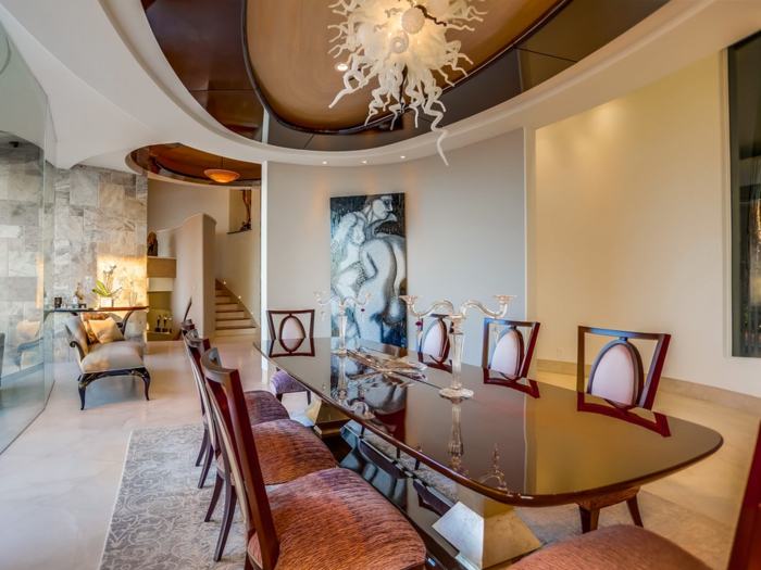 According to Robb Report, the home has a split-level game and family room.