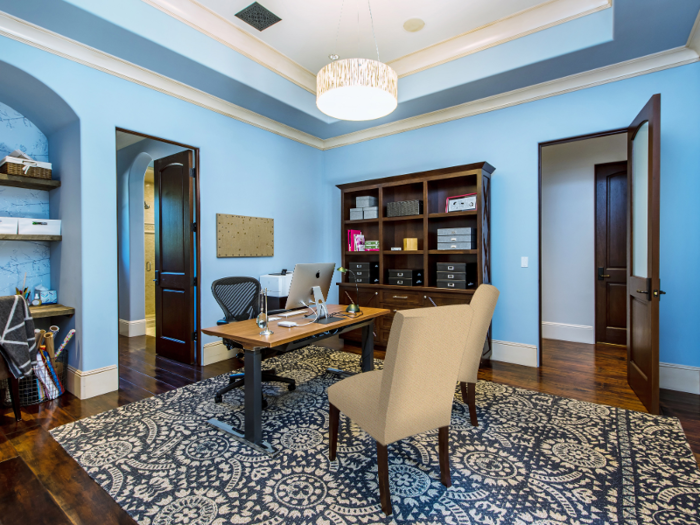 A home office is located in the "master wing" of the home.