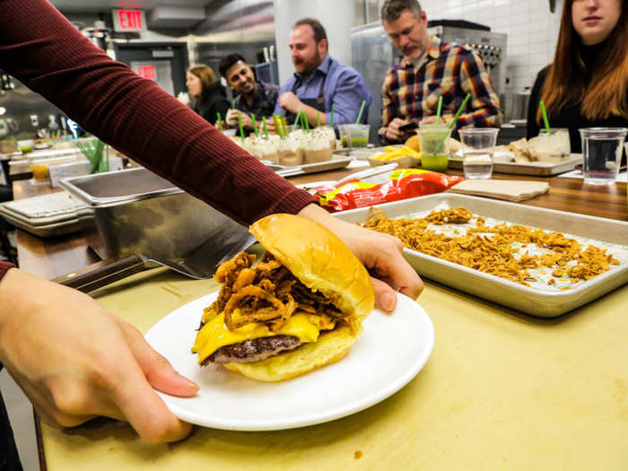 Finally, I plated my burger, smeared on a bit of Shack Sauce, and topped it with a generous grab of fried shallots.