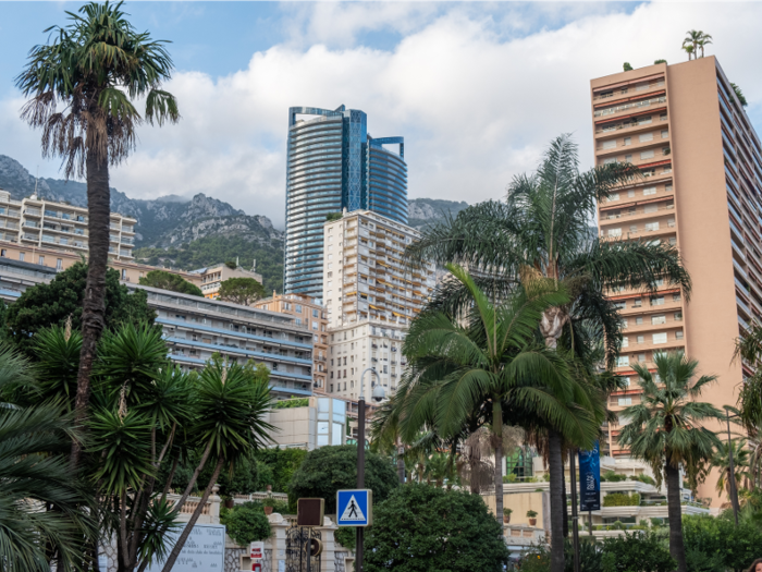 Through the palm trees and high-rises, I could spot the glossy Odeon Tower rising above the other buildings.