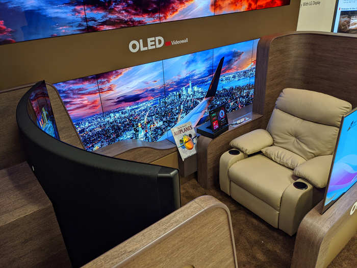 LG imagined a plane cabin with OLED screens throughout, plus 65-inch personal TVs for first-class passengers.