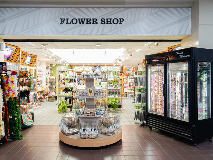 This flower shop sells fresh leis made from Hawaiian flowers.