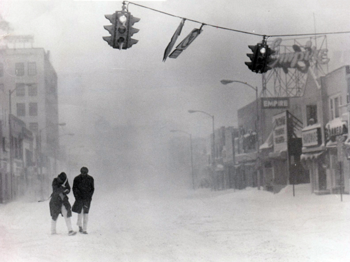 Traffic lights swung in the wind, as two people, bundled up against the snow, strolled through New York in 1978.