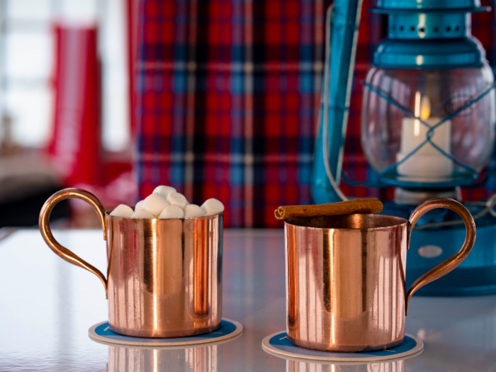 Seasonal cocktails include the "Weather Delay," a hot chocolate drink spiked with Belvedere vodka, and "Idlewild Hot Toddy," made with Sailor Jerry spiced rum and hot apple cider.