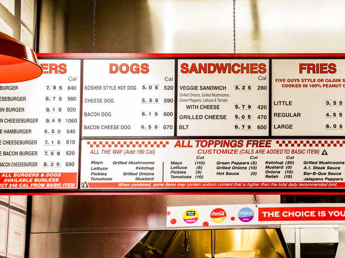 Its menu is also bigger. Although fries are the only side it sells, the chain also sells hot dogs and sandwiches.