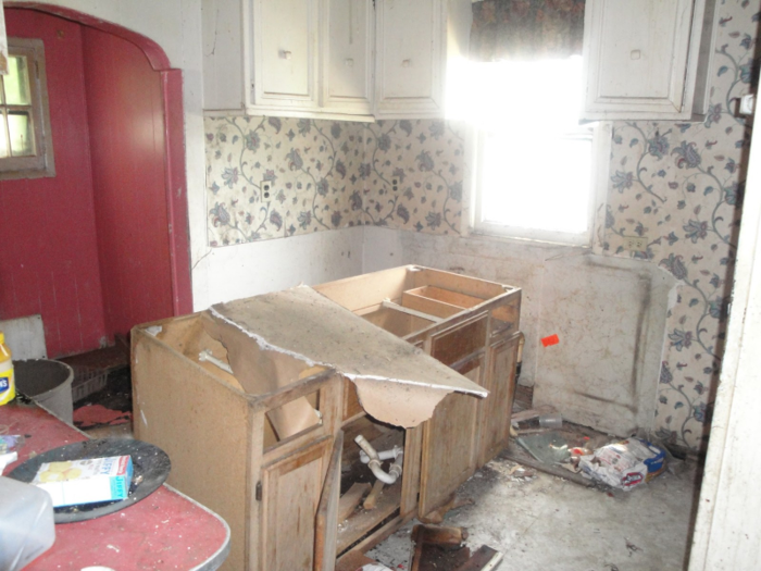 "It was completely trashed," she explained. "It had a hole in the back underneath what I call the nook in the kitchen."