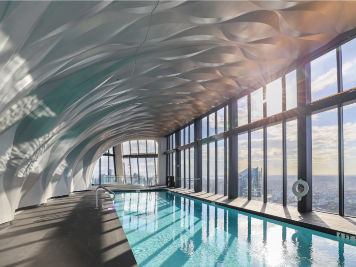 The double-height aquatic center and its indoor pool overlook downtown Miami.