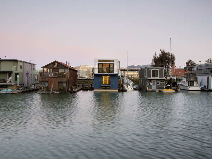 The structure is different from a houseboat because while it floats, it will stay in the same place.