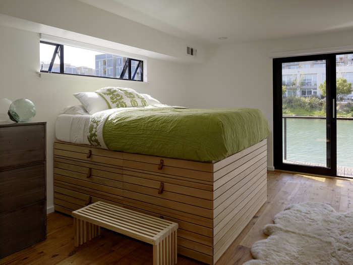 "There was a lot of pressure to use every nook and cranny for storage on boats and floating houses," Nebolon told Business Insider. One solution he found was raising beds for plenty of storage underneath.