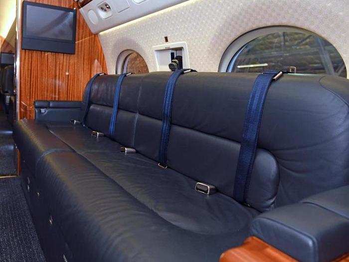 Up to four people can sit on a single couch alone, maximizing the capacity of the aircraft.