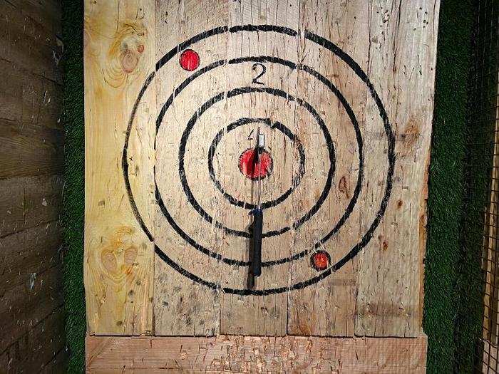 Scoring works similarly to other target-based sports like darts and archery. A bullseye is worth five points, and each concentric circle radiating outward from the center is worth four, three, two, and one point, respectively.