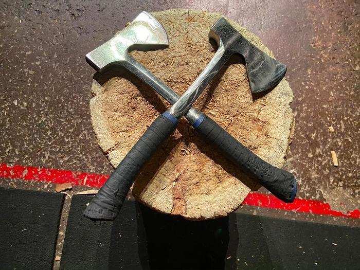 While the axes certainly have heft, they were much lighter and duller than I expected. Flesher-Sonnier said Kick Axe uses "camp hatchets" for safety purposes.