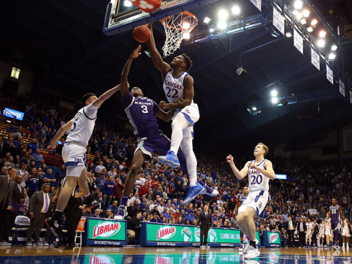 With his team up by 21 points, Jayhawks big man Silvio De Sousa sprinted the length of the floor for a massive chase-down block that sent Gordon to the hardwood. Then De Sousa stood over him menacingly.