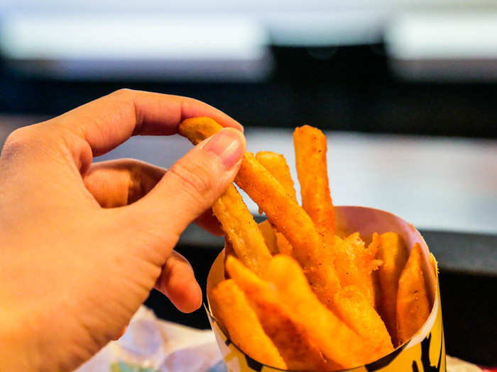 A nacho fry is basically a fry dusted with vaguely "Mexican-inspired" seasoning and dipped in queso.