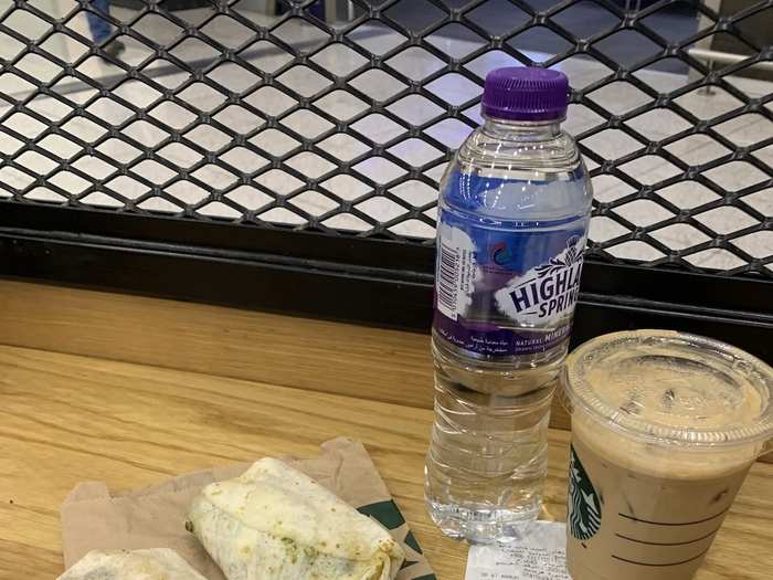 I was almost immediately due catch a connecting flight with Saudia to AlUla, in the north of the country. I grabbed the only available sustenance — a wrap from Starbucks — and pressed on.