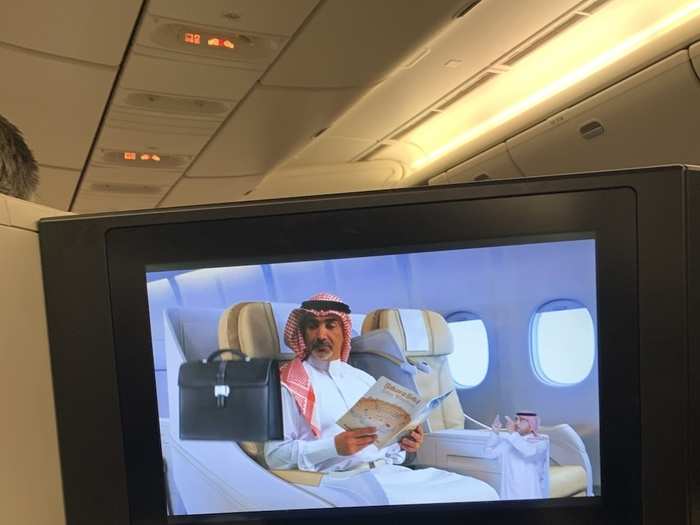 Moments later, the in-flight safety video started. It starred a Saudi man in a traditional thawb and keffiyeh, apparently watching a sign language interpreter levitate his briefcase into the overhead locker.