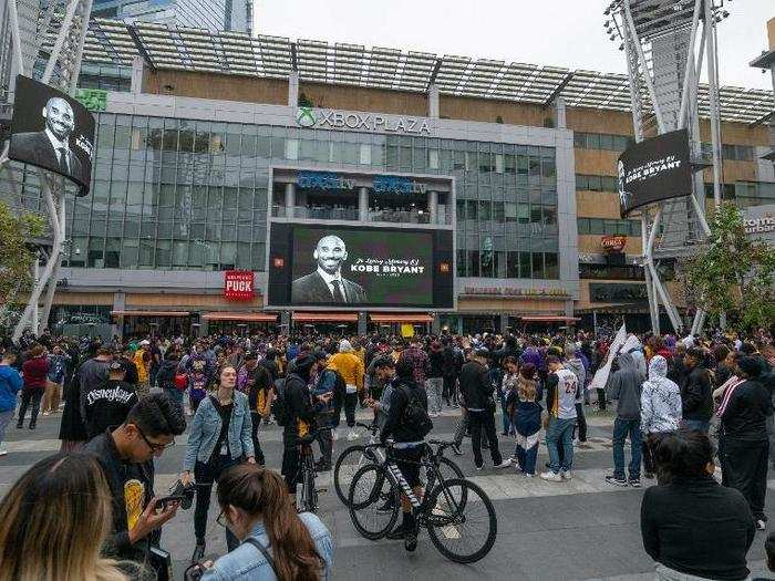 Screens outside the Staples Center displayed a memorial to Bryant throughout the day following the crash.