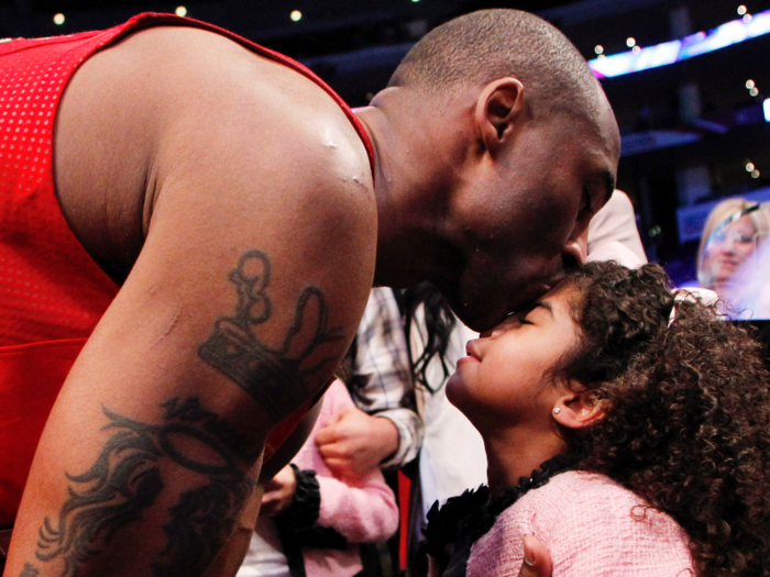 The Black Mamba won his fourth and final NBA All-Star game MVP award in 2011, and he gave Gigi a celebratory kiss afterwards.