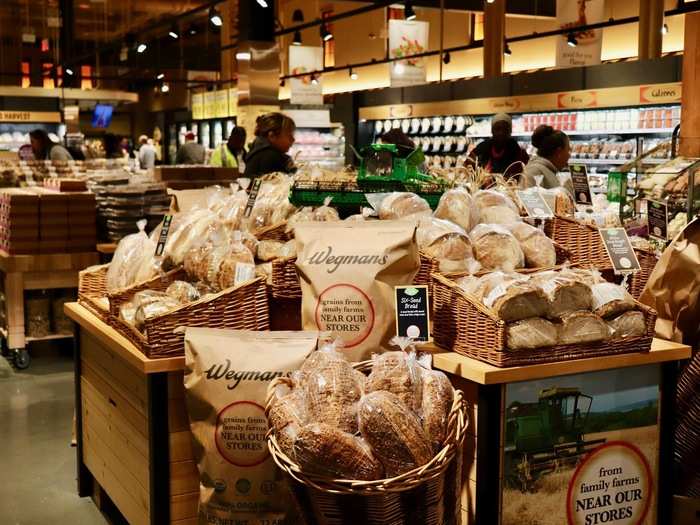 This was accomplished through the warm lighting, dark wood display bins, and charming wicker baskets scattered throughout the store.