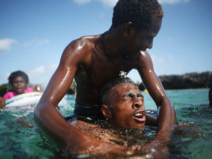 People swim. Which is handy as daily temperatures have risen.