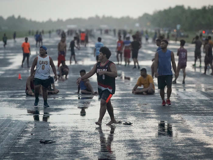 Tuvalu gets three commercial flights a week. For the rest of the week, locals make the most of the airport runway, playing and hanging out on the tarmac.