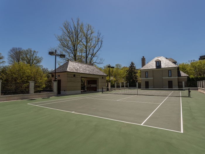 Outdoors, the southern side of the estate has a full-size tennis court.