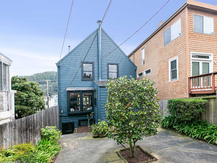 The backyard of the front home opens up to a small, serene courtyard.