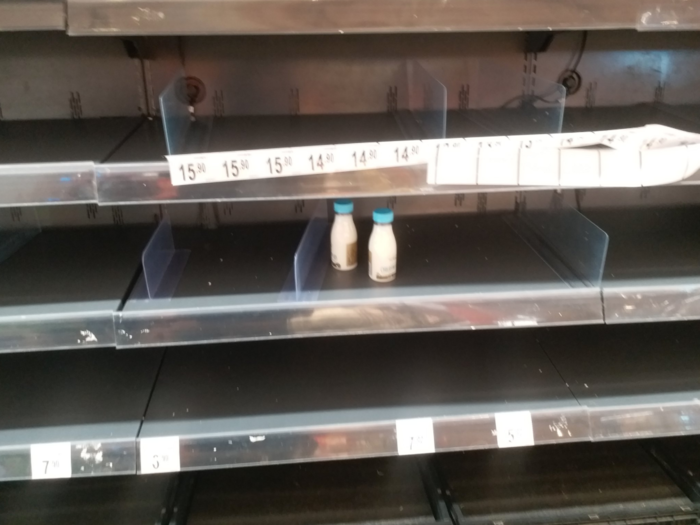 Meanwhile, in the dairy section, there were just two lone bottles of milk.