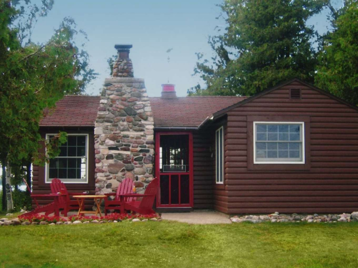 According to the listing, it includes a two-bedroom cottage, a garage, and a guest house which is located in the woods and can sleep up to four people.